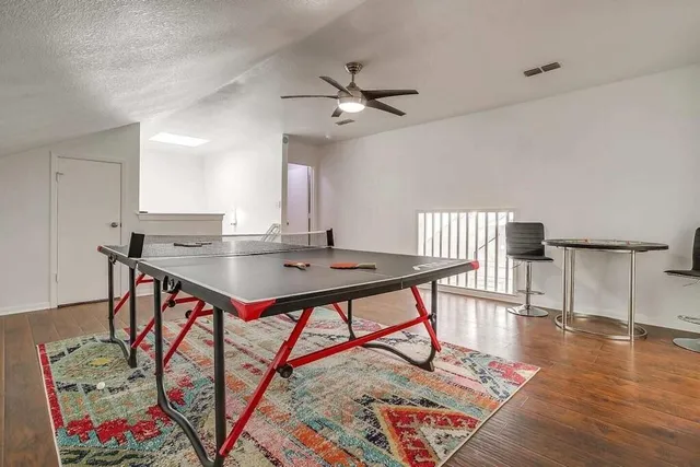 a view of a workspace with furniture