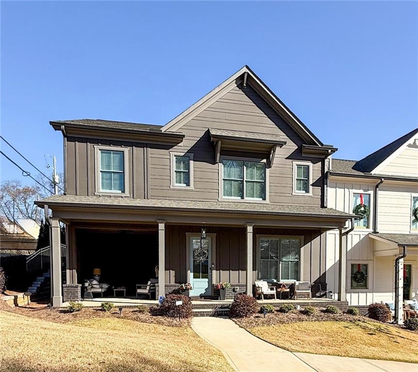 5736 Main Street Flowery Branch, GA 30542 - Photo 2 of 30 a view of the house with outdoor space