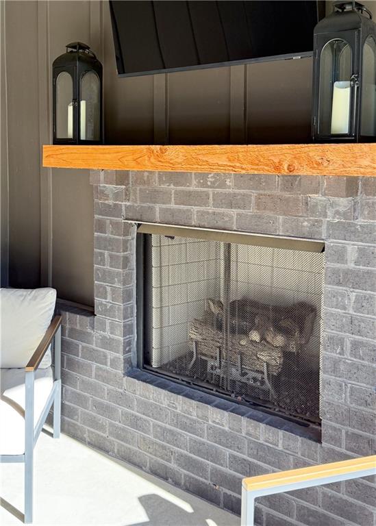 5736 Main Street Flowery Branch, GA 30542 - Photo 30 of 30 a bathroom with a bathtub