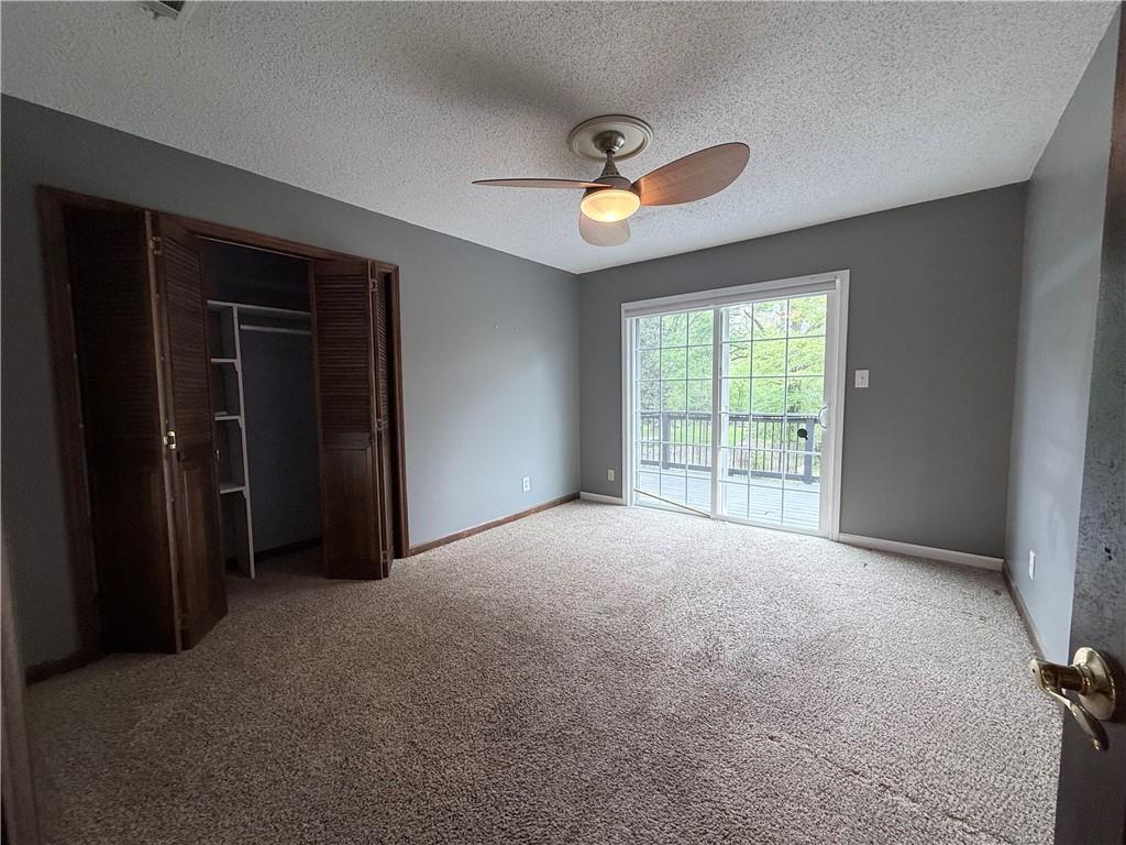 3033 Riviera Drive Conyers, GA 30012 - Photo 20 of 79 an empty room with windows and closet