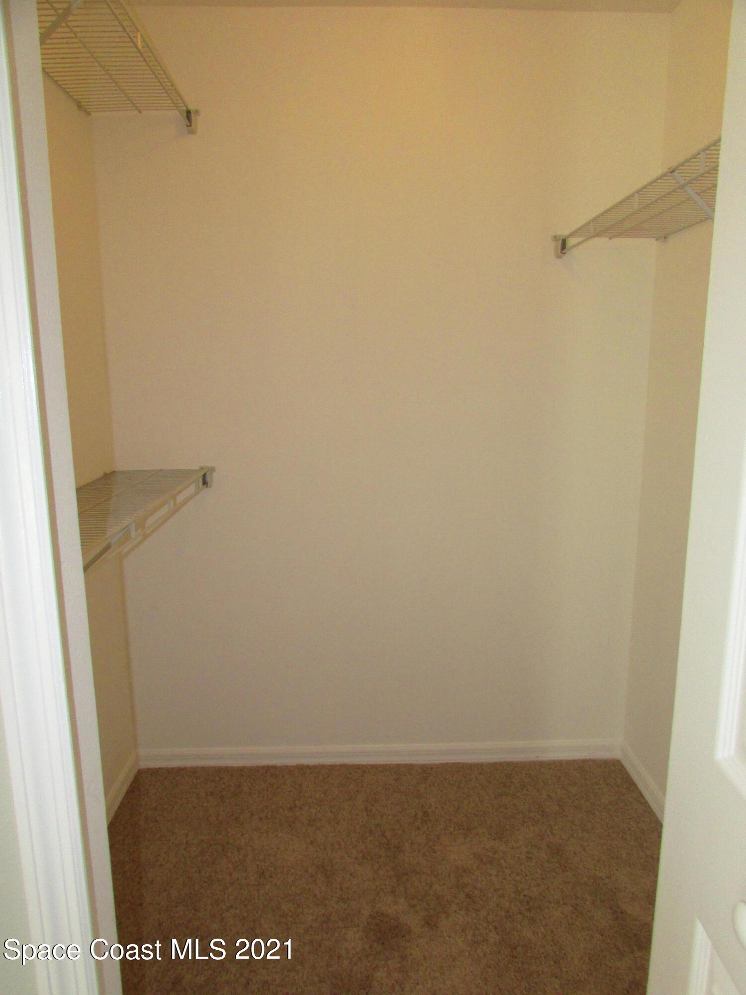 418 Titan Road Southeast Palm Bay, FL 32909 - Photo 9 of 15 Master BR Closet