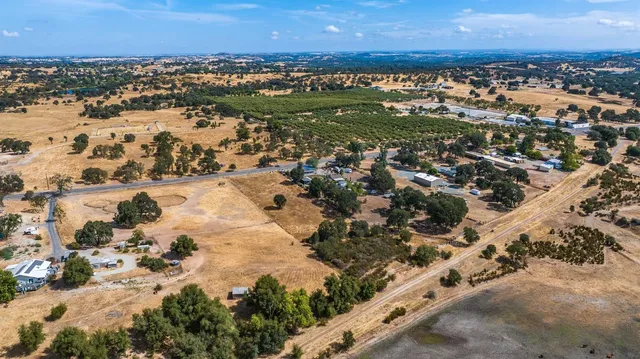 a street sign on a street next to a building