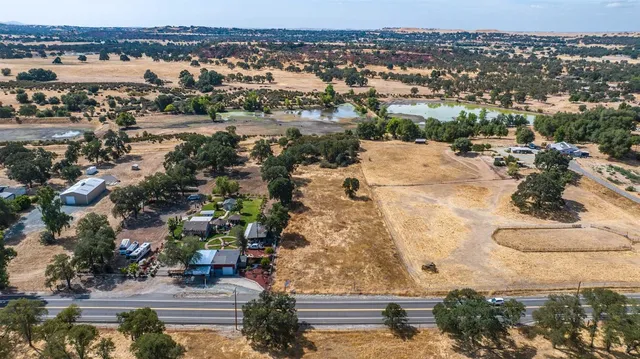 an aerial view of residential building and lake view