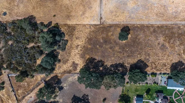 a view of a backyard of a house
