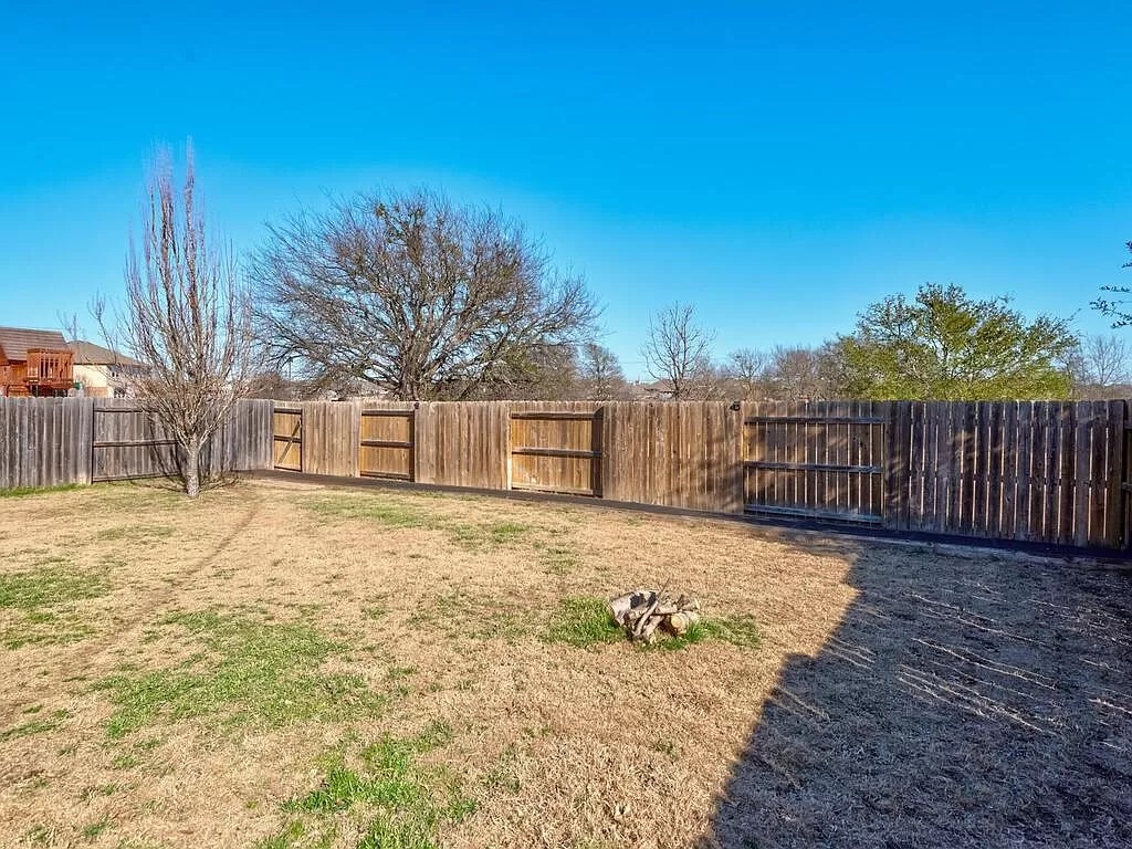 8217 Reggio Street Round Rock, TX 78665 - Photo 26 of 27 View of fenced backyard