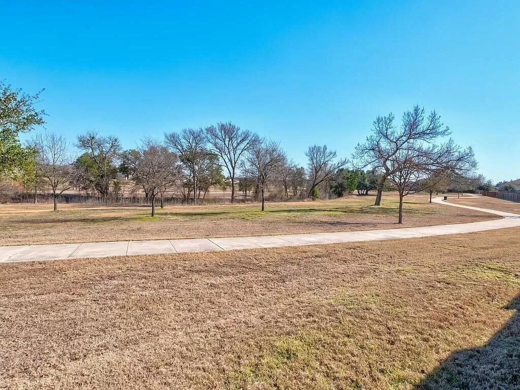 8217 Reggio Street Round Rock, TX 78665 - Photo 27 of 27 View of home's community featuring a yard
