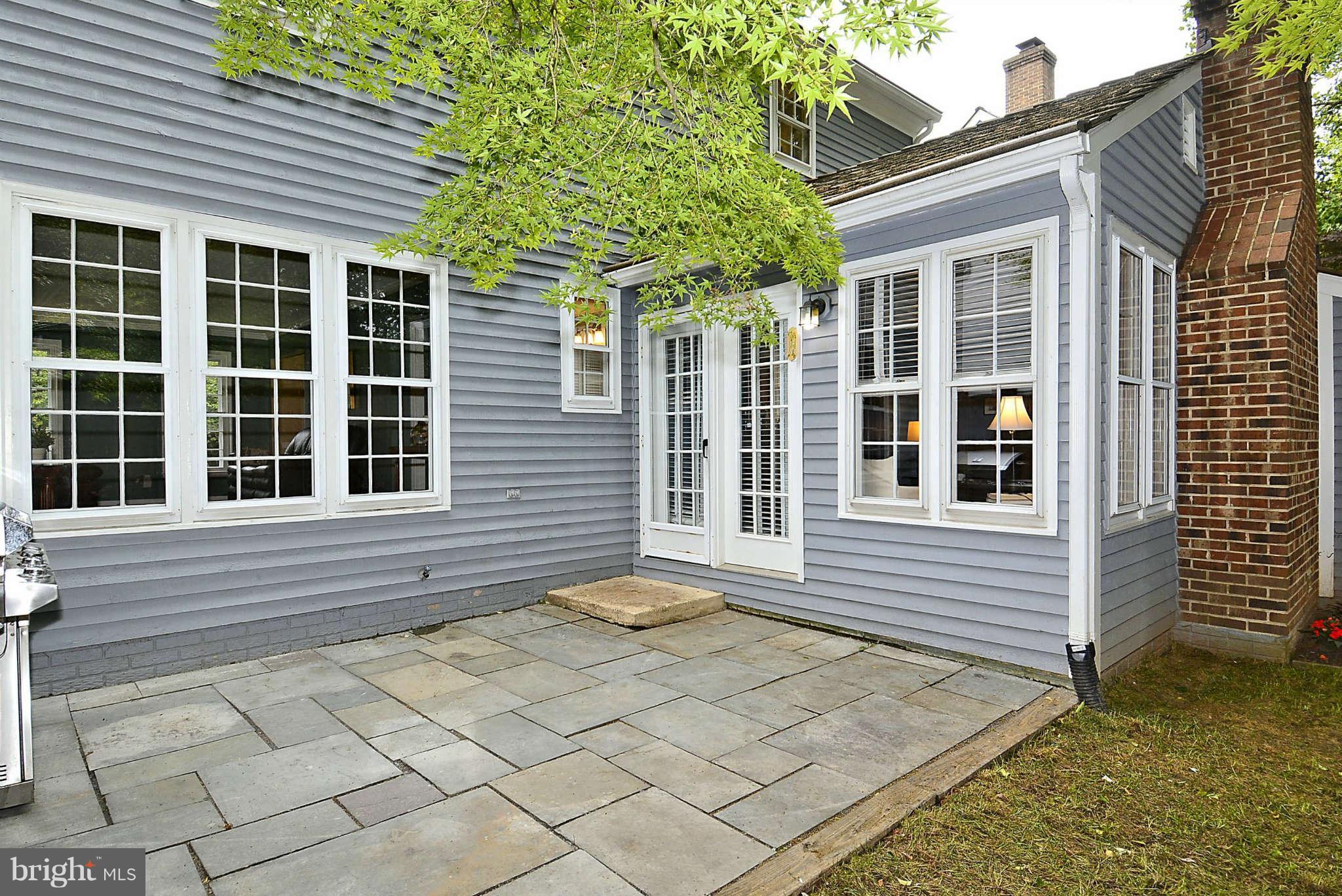 2090 Cobblestone Lane Reston, VA 20191 - Photo 22 of 27 a front view of a house with a yard