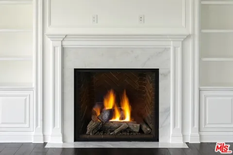 a living room with a fireplace