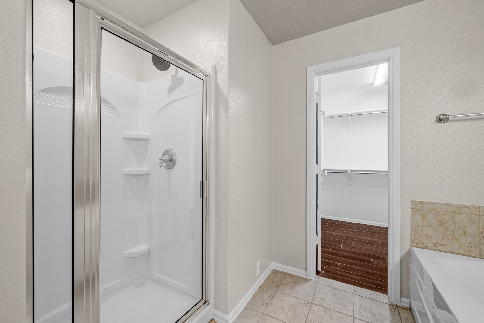 217 Inca Dove Lane Leander, TX 78641 - Photo 17 of 40 a bathroom with a shower and a sink