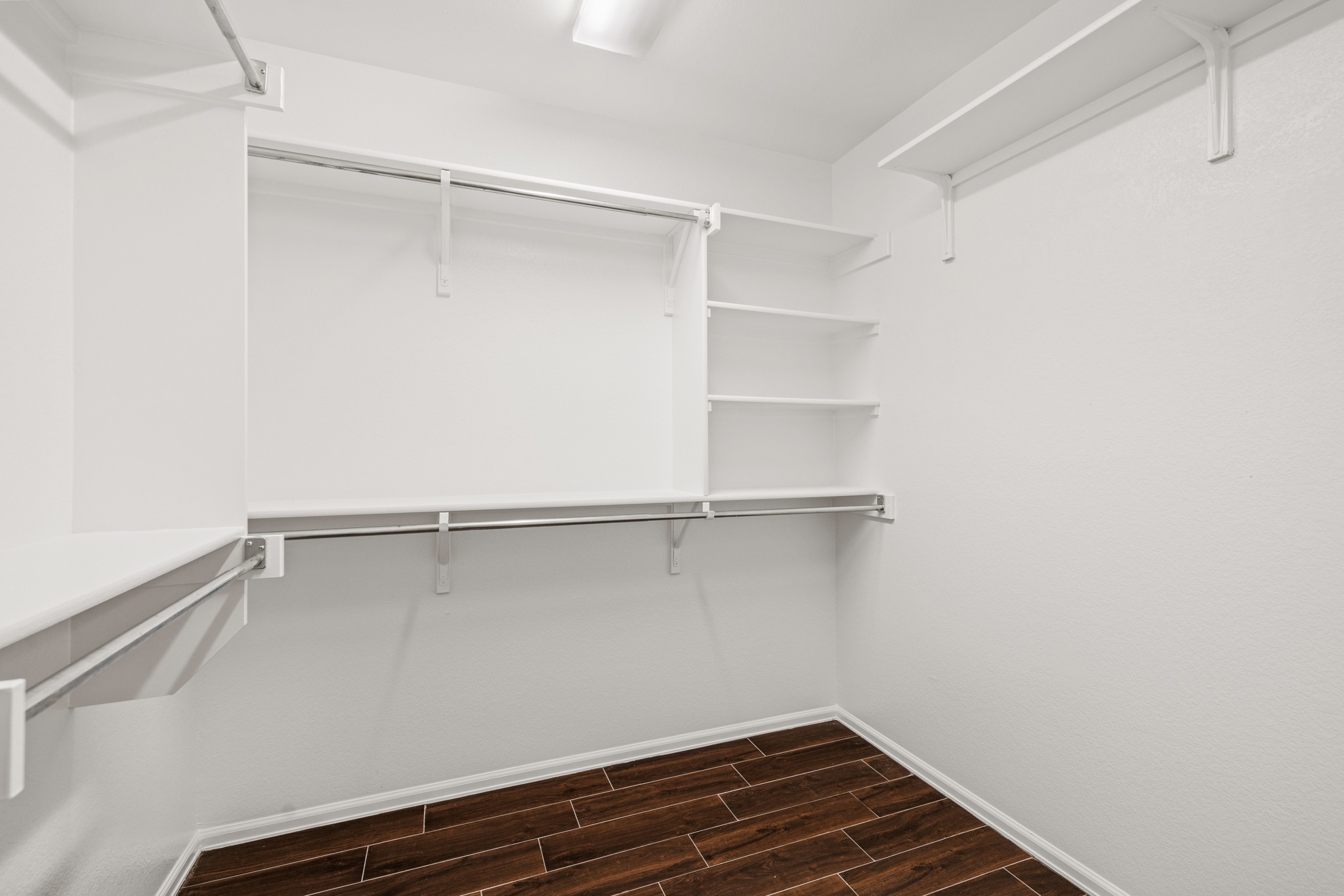 217 Inca Dove Lane Leander, TX 78641 - Photo 18 of 40 a view of an empty walk in closet