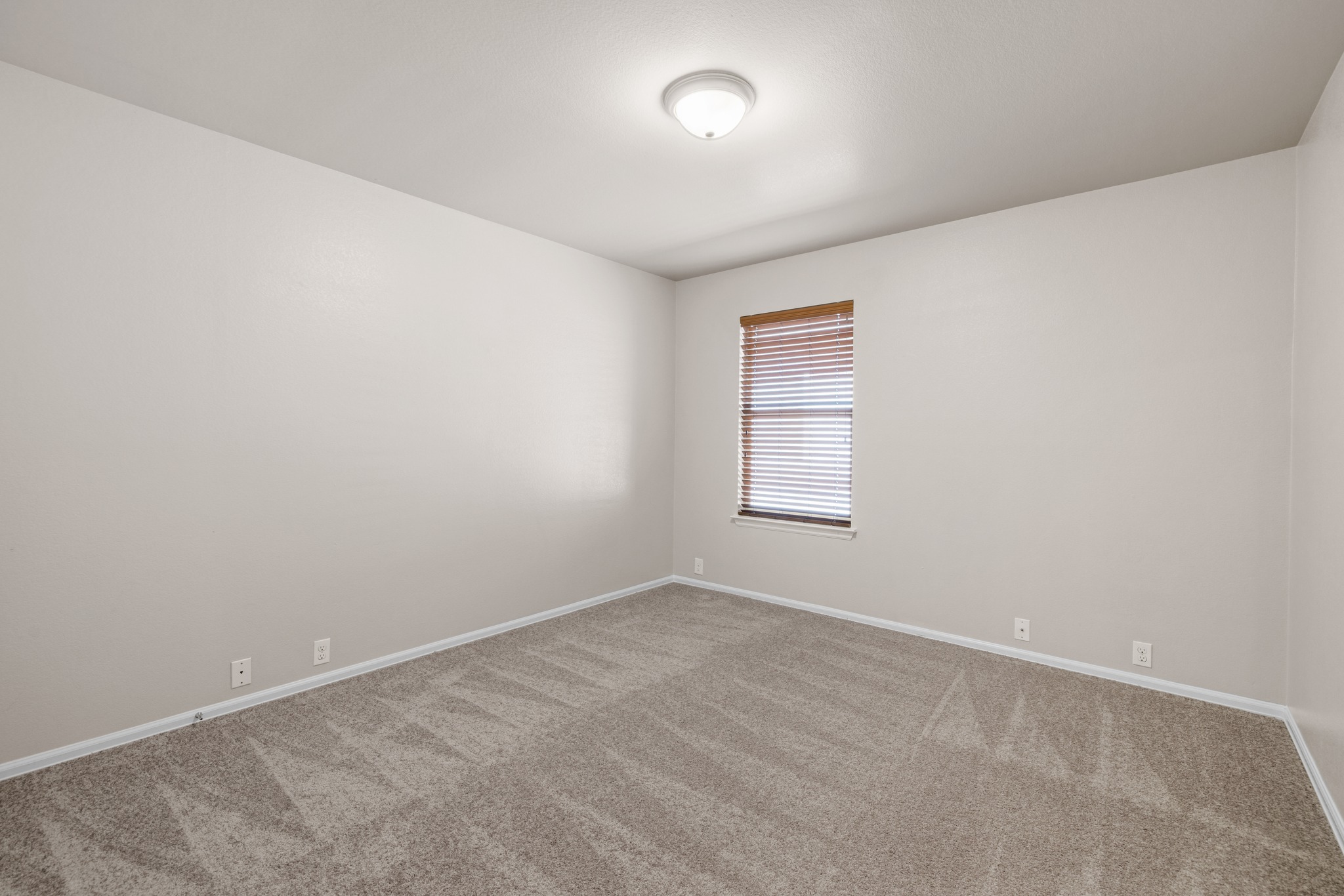 217 Inca Dove Lane Leander, TX 78641 - Photo 22 of 40 an empty room with windows