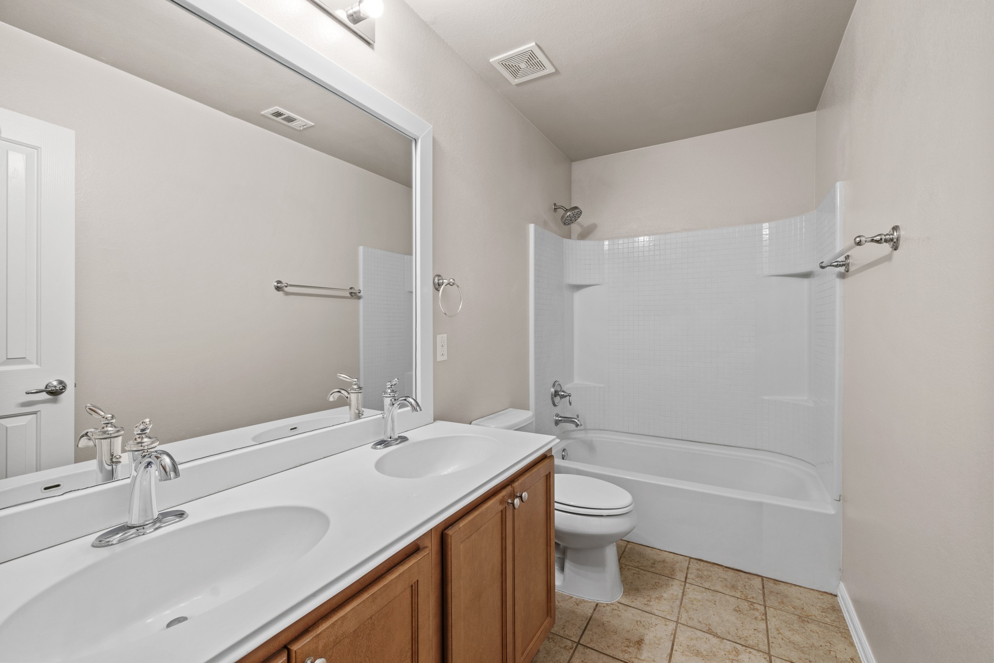 217 Inca Dove Lane Leander, TX 78641 - Photo 24 of 40 a bathroom with a sink a toilet and shower