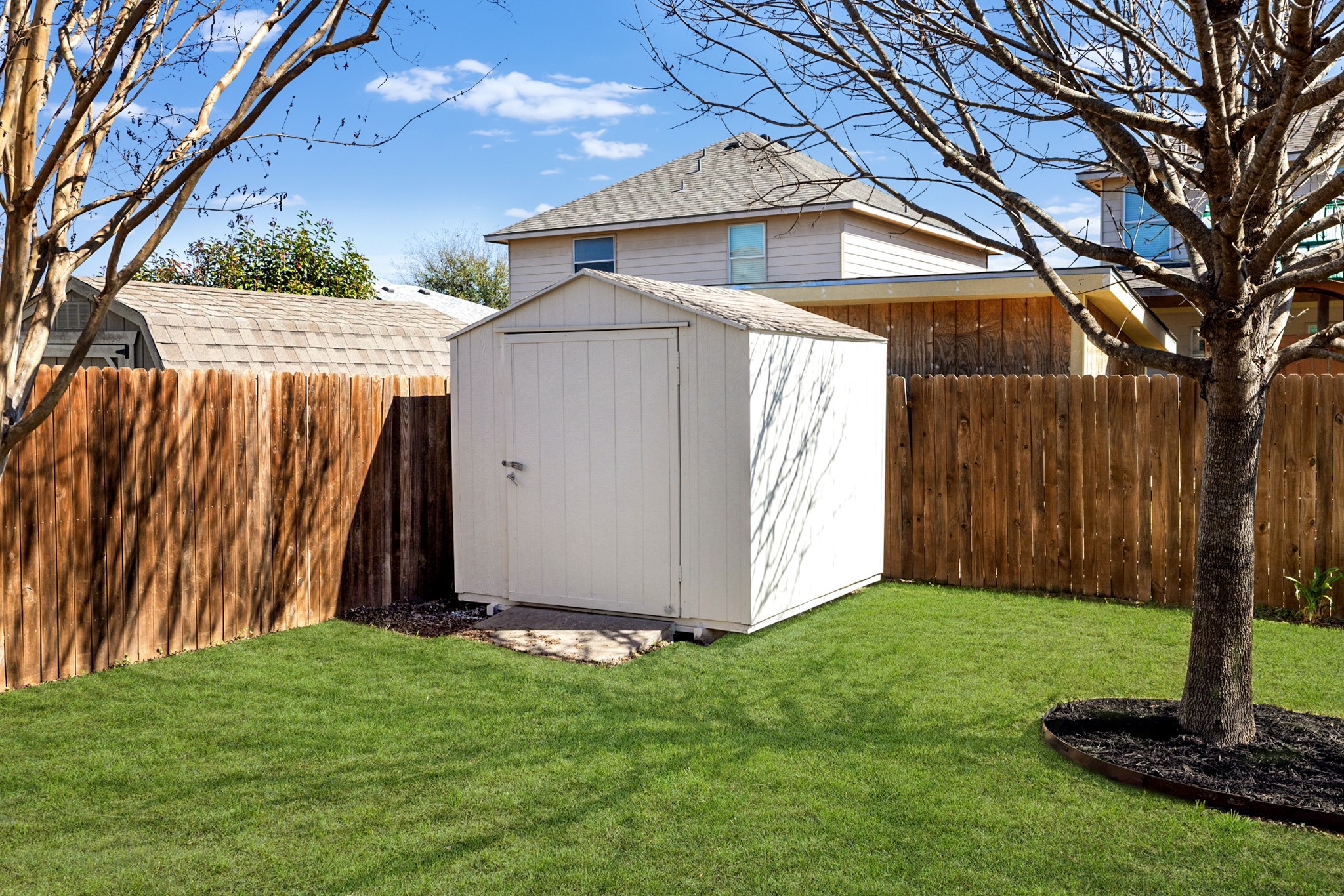 217 Inca Dove Lane Leander, TX 78641 - Photo 26 of 40 a side view of a house with a yard