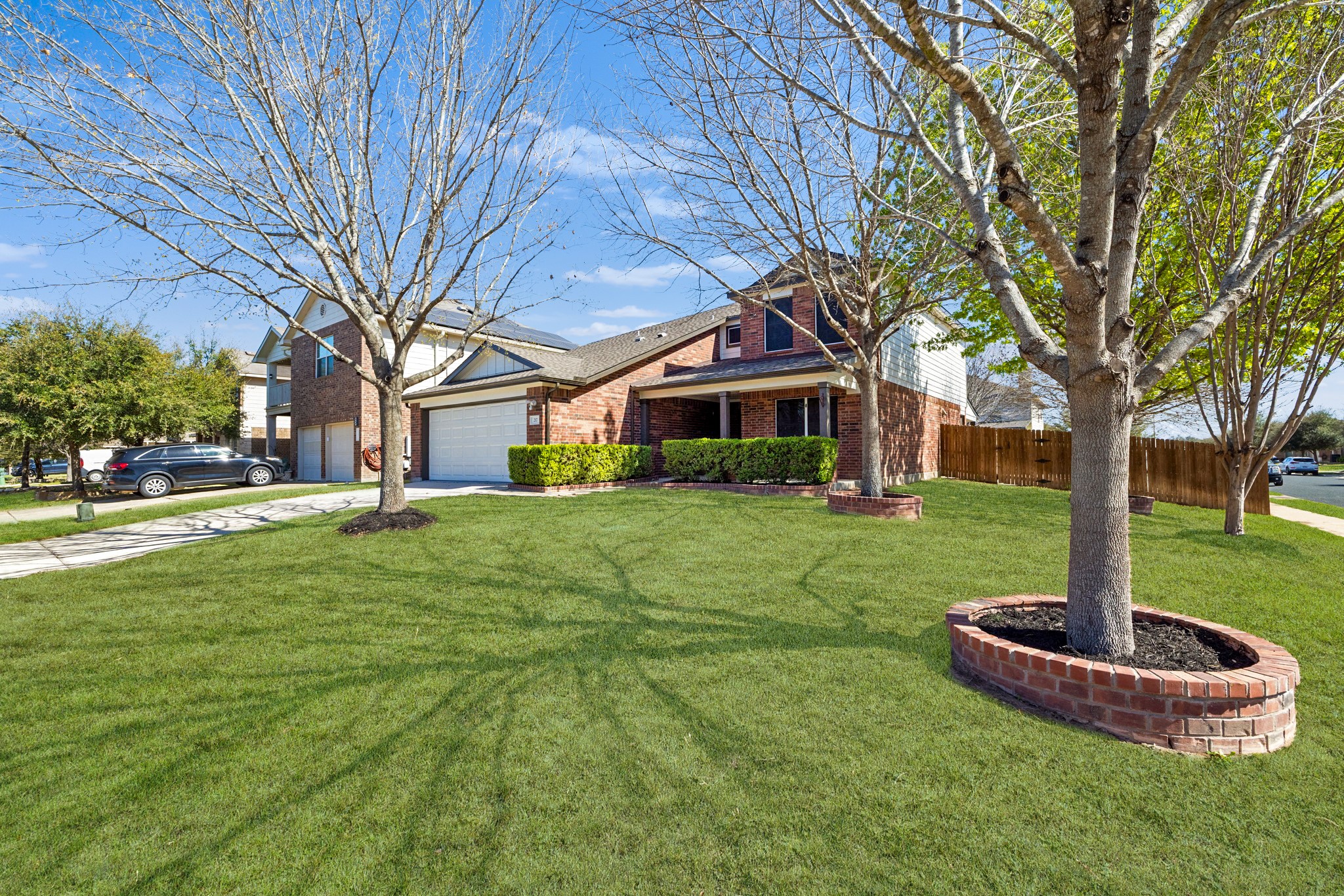 217 Inca Dove Lane Leander, TX 78641 - Photo 3 of 40 a front view of a house with a yard