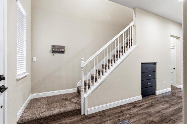 2178 Al Fonseca Lane Manteca, CA 95337 - Photo 17 of 46 a view of entryway with stairs and wooden floor
