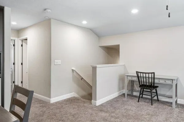 a view of a hallway with workspace