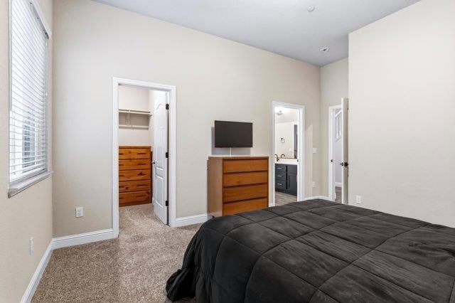 2178 Al Fonseca Lane Manteca, CA 95337 - Photo 28 of 46 a bedroom with a bed and a television