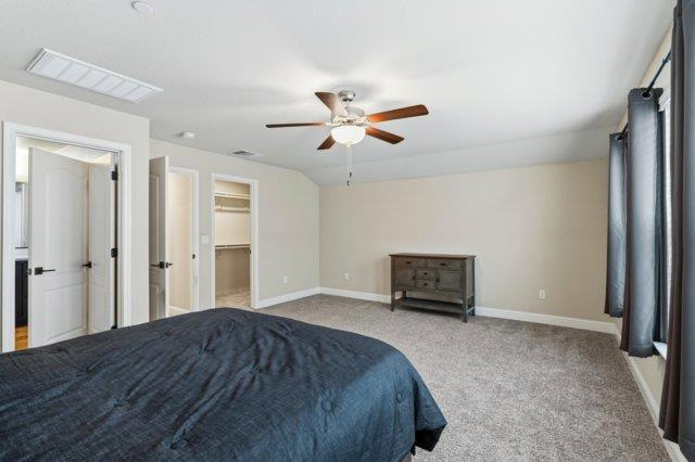 2178 Al Fonseca Lane Manteca, CA 95337 - Photo 36 of 46 a bedroom with a bed and a ceiling fan