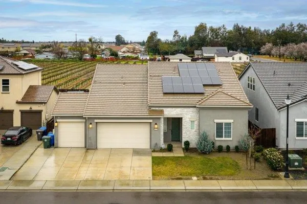 a view of a house with a swimming pool