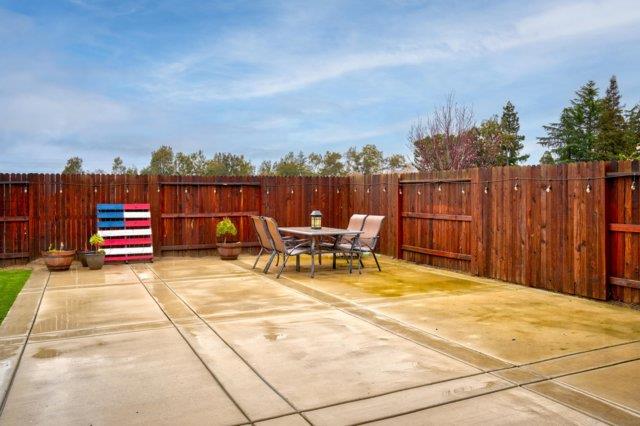 2178 Al Fonseca Lane Manteca, CA 95337 - Photo 41 of 46 a view of swimming pool with outdoor seating and yard in the back