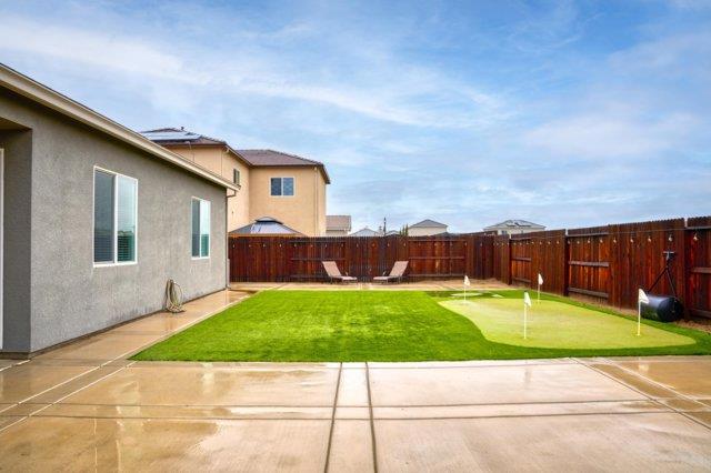 2178 Al Fonseca Lane Manteca, CA 95337 - Photo 43 of 46 a view of a backyard with a garden