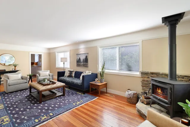 a living room with furniture or couch and a window