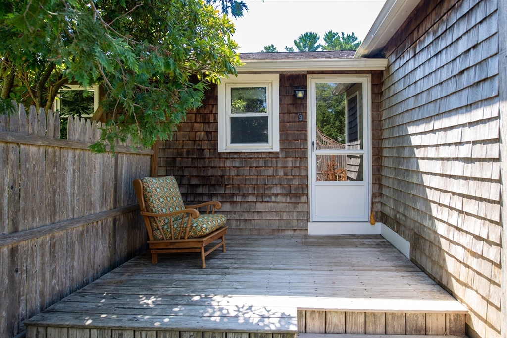 9 Morrison Way Lakeville, MA 02347 - Photo 4 of 28 a view of a porch with a bench