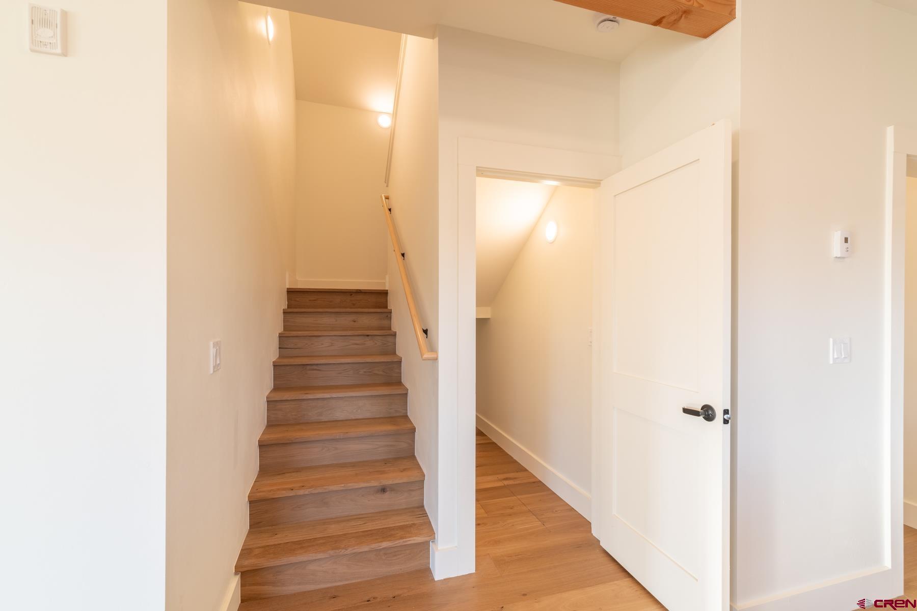 417 South Boulevard Street, Unit B Gunnison, CO 81230 - Photo 13 of 26 a view of a hallway with wooden floor and entryway