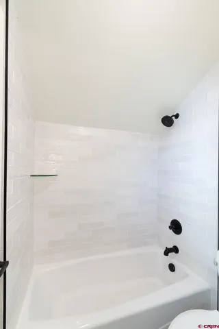 a bathroom with a bathtub