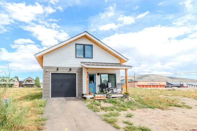 a view of a house with patio