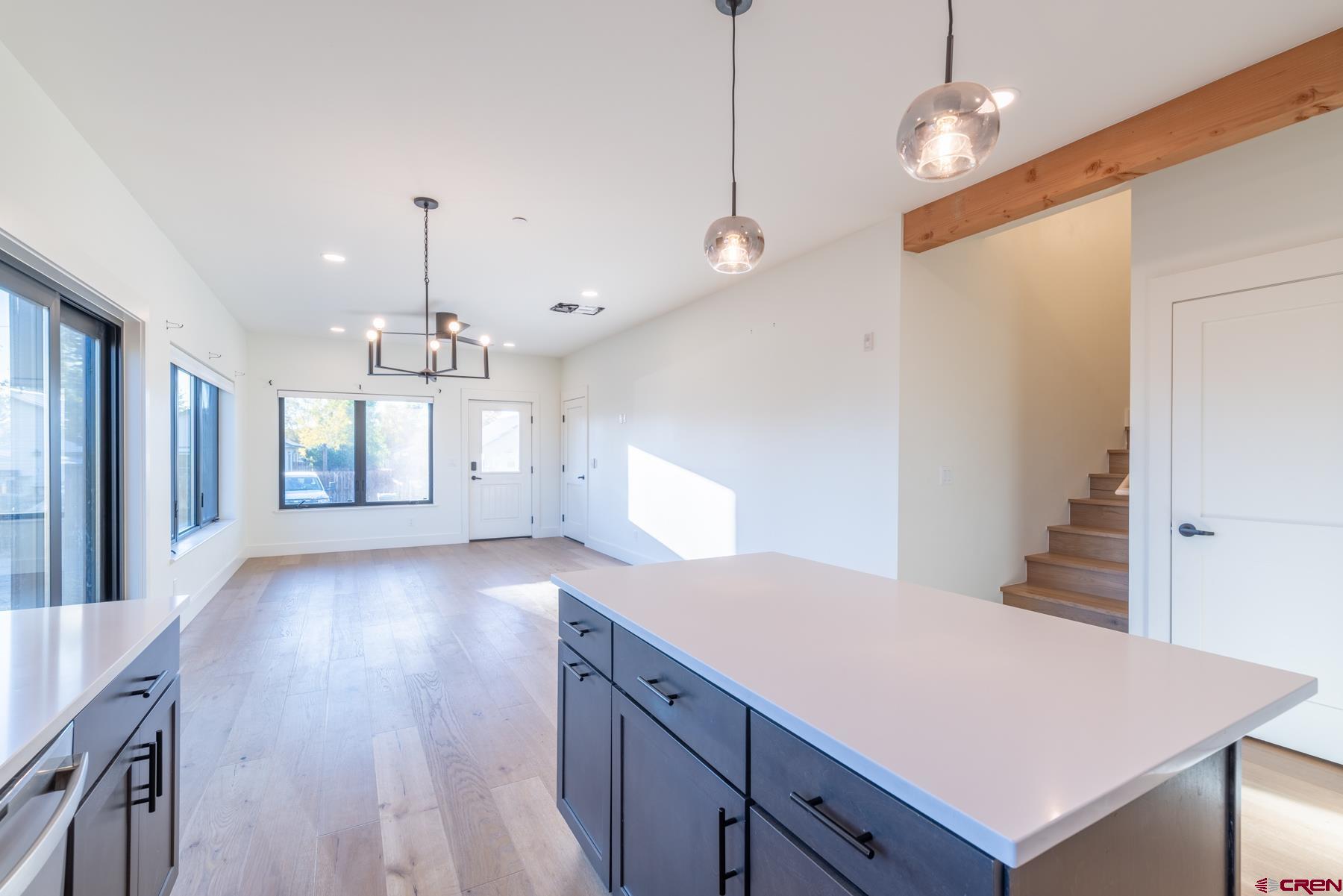 417 South Boulevard Street, Unit B Gunnison, CO 81230 - Photo 5 of 26 a view of a kitchen and a chandelier