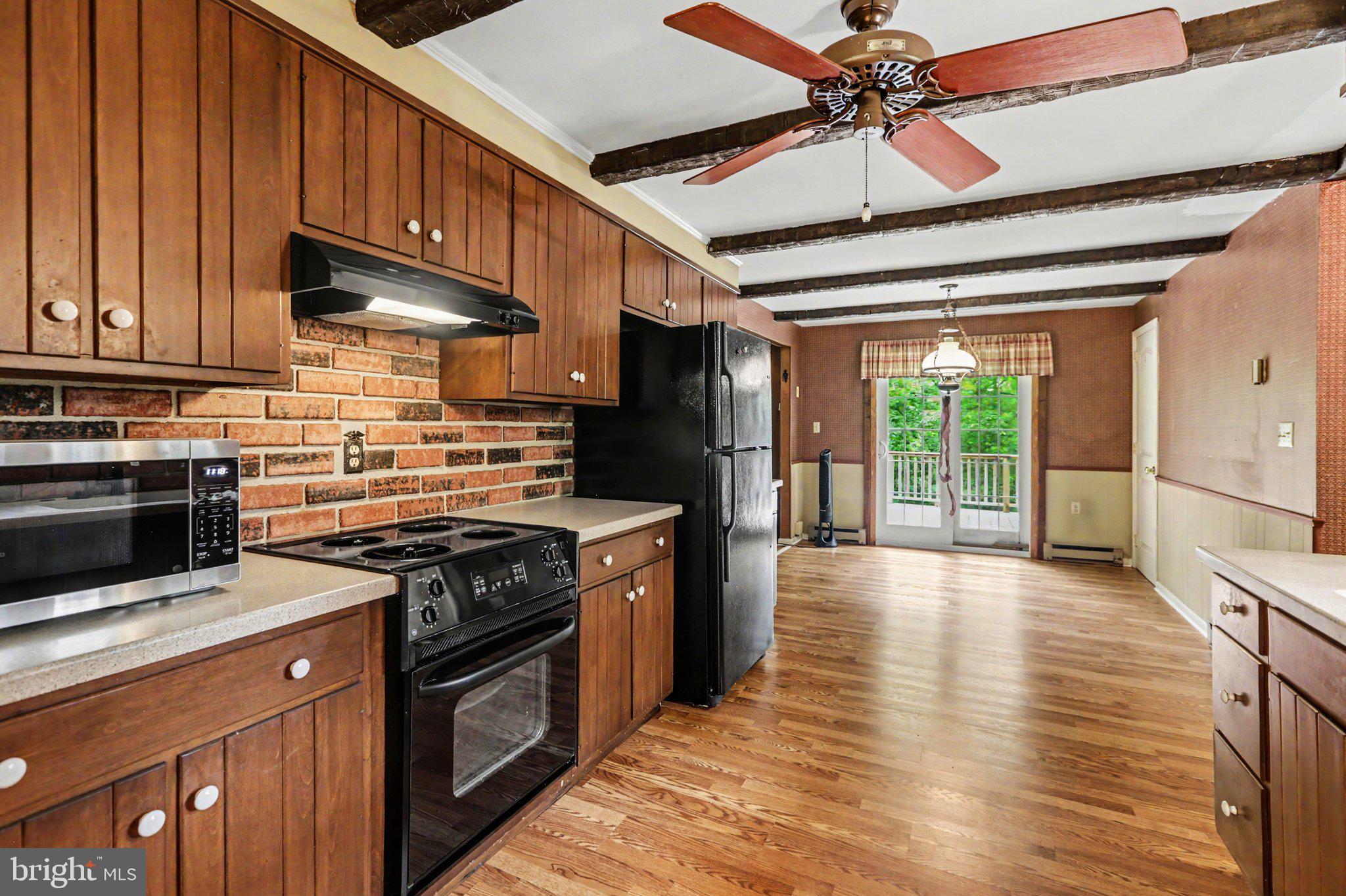 1150 South York Road Dillsburg, PA 17019 - Photo 10 of 41 Kitchen w/ LVP flooring & Corian counters