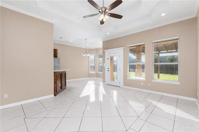 a view of livingroom with hardwood floor and a ceiling fan