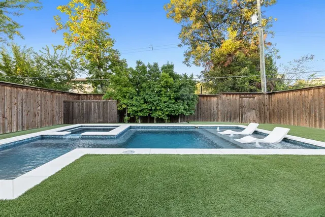 a view of outdoor space yard and swimming pool
