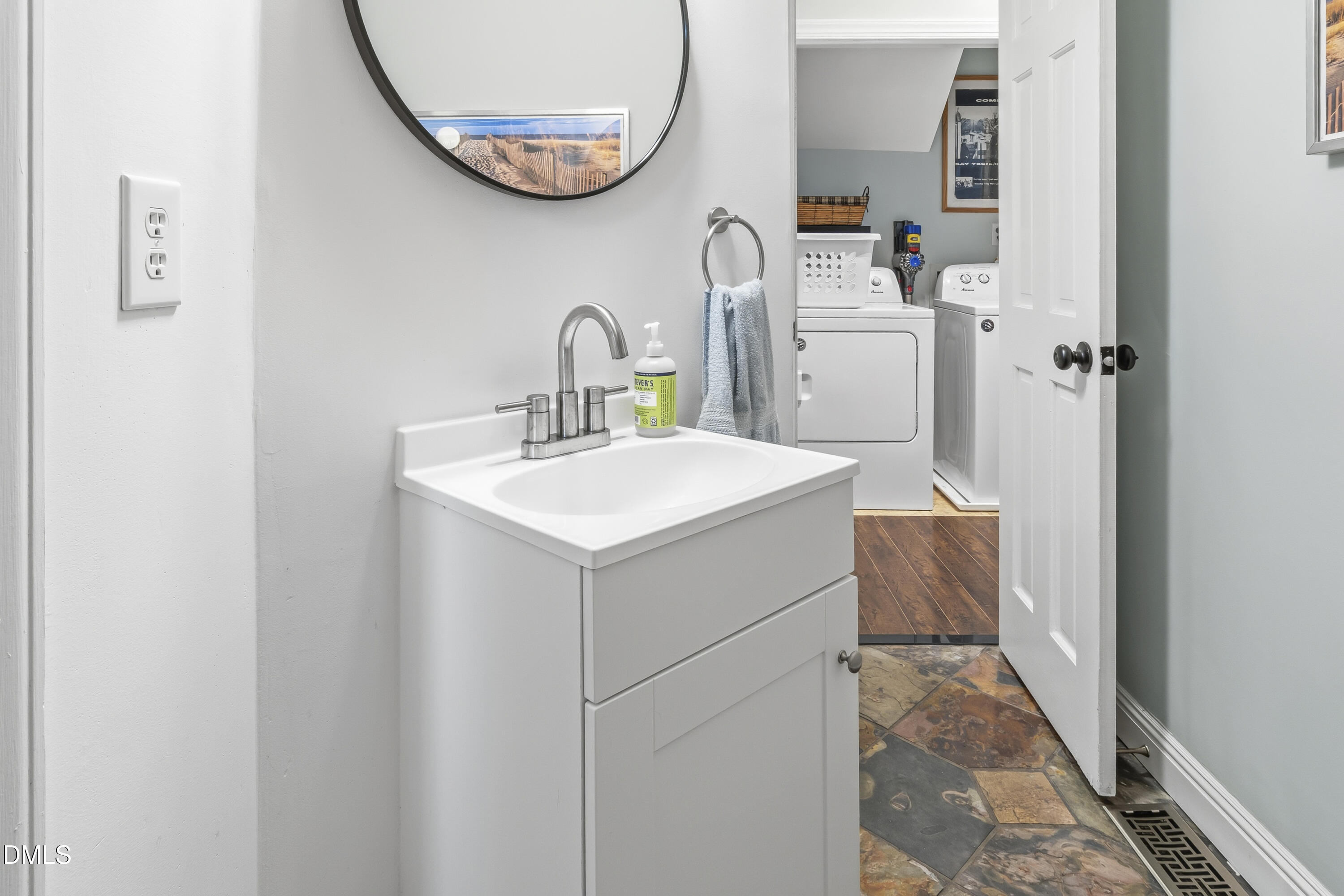 3004 West Annaley Drive Raleigh, NC 27604 - Photo 29 of 44 a room with a sink and a mirror