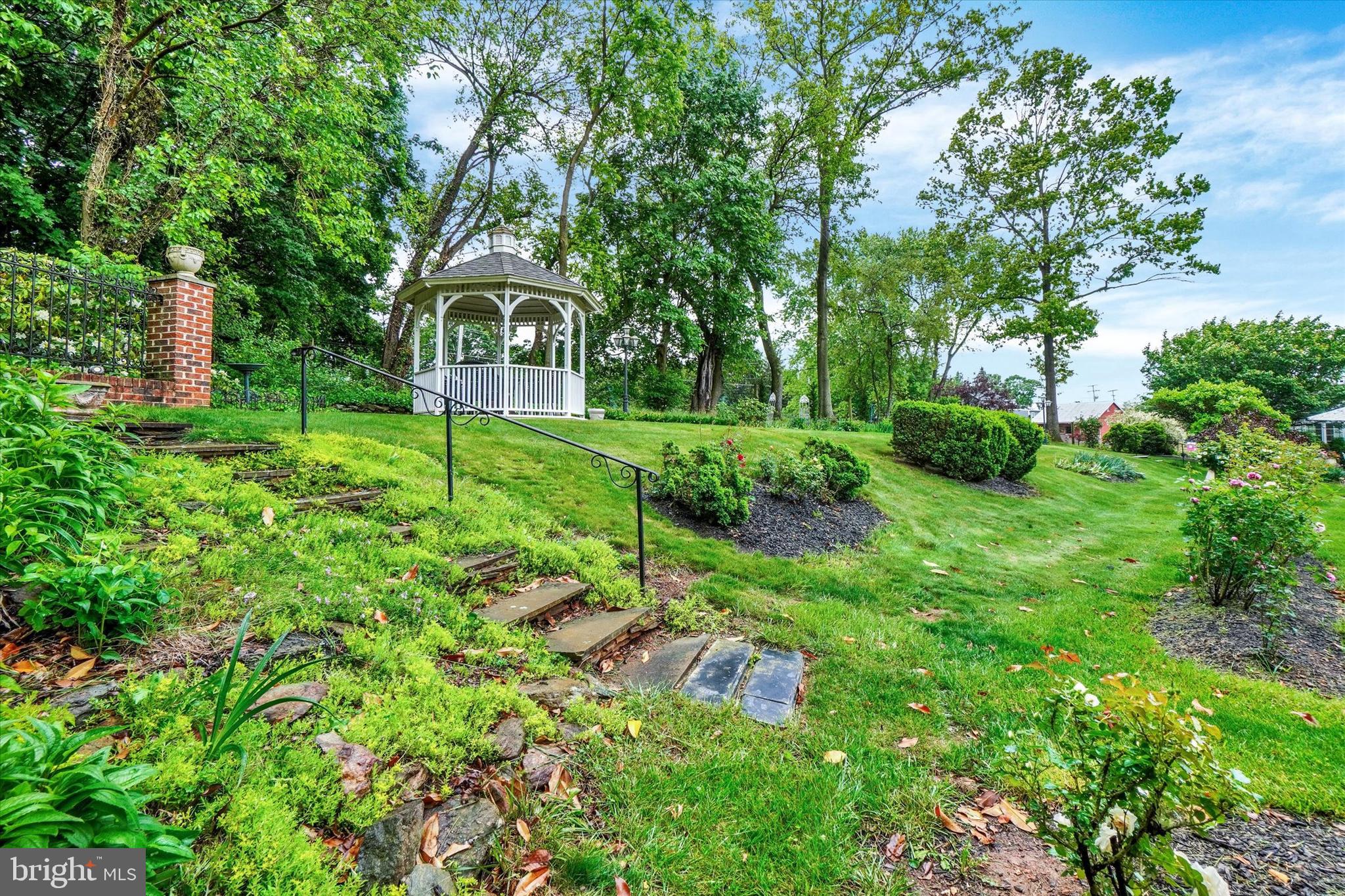13228 Frank Road New Freedom, PA 17349 - Photo 10 of 83 Gazebos, Magnolia trees, roses, and more!