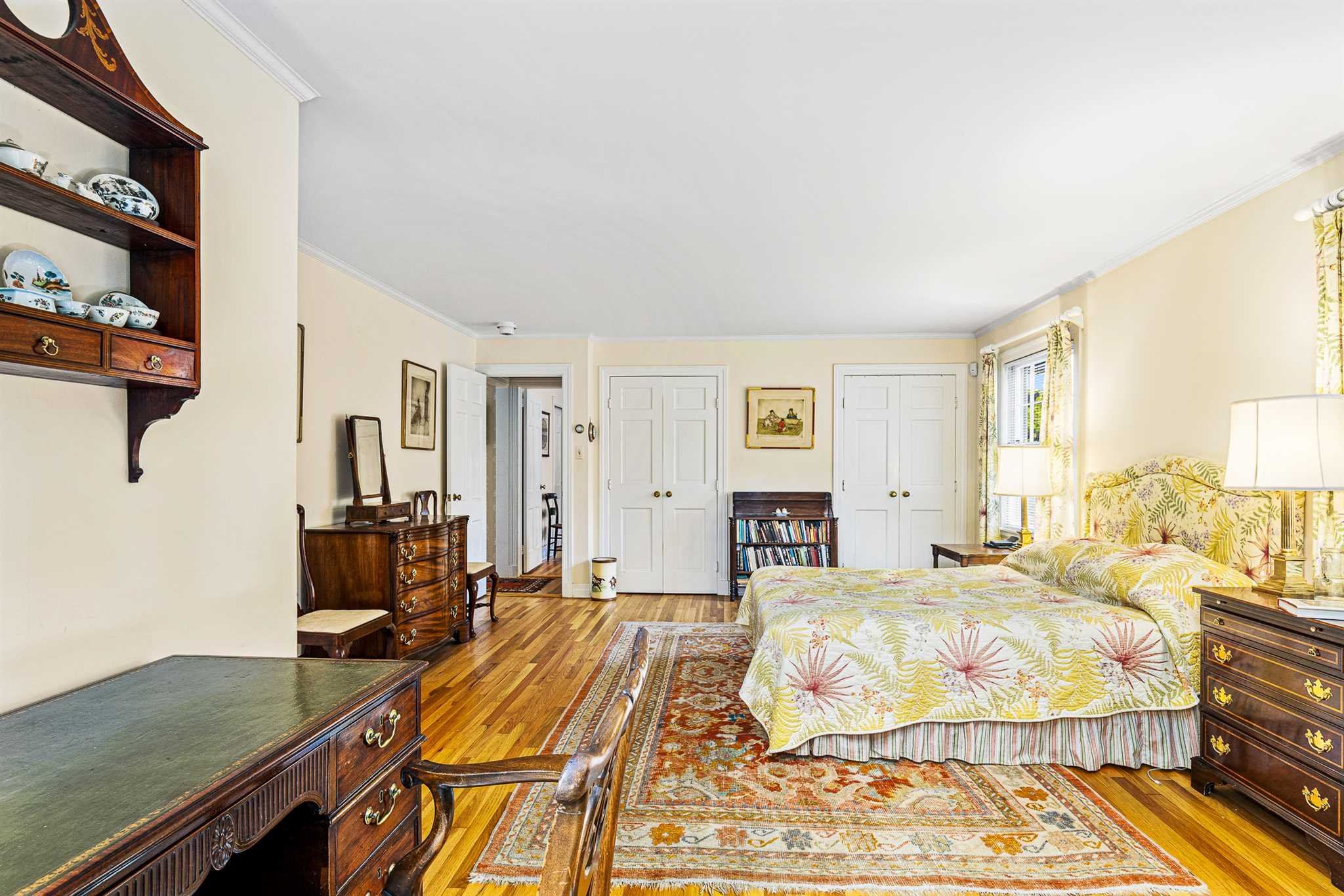 78 Maple Avenue Millbrook, NY 12545 - Photo 21 of 35 a bedroom with a bed and wooden floor