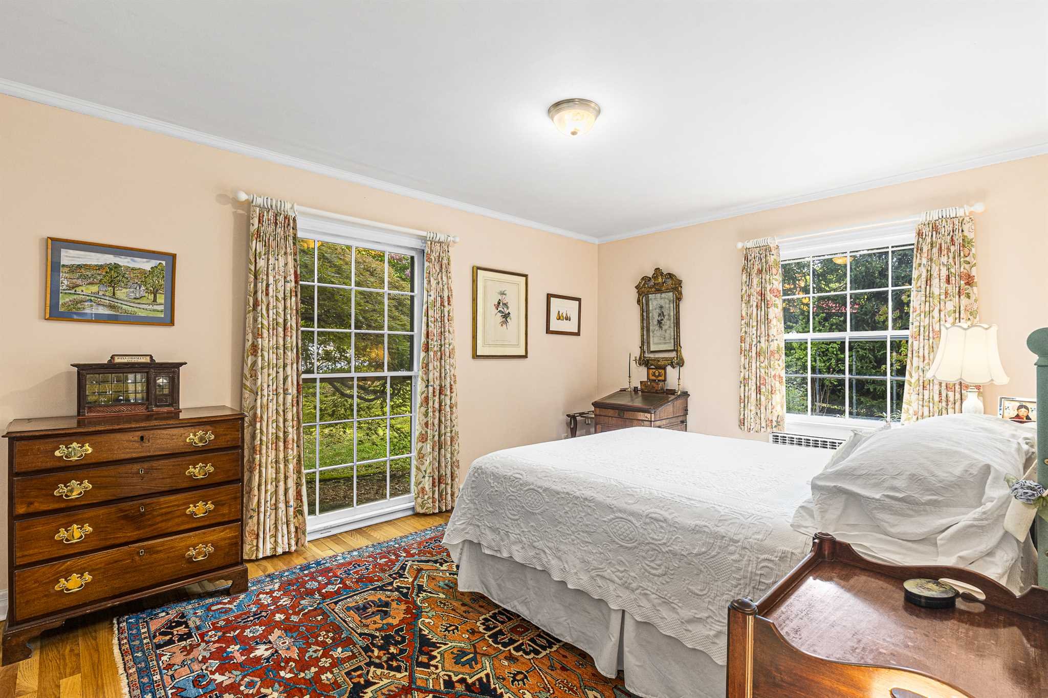 78 Maple Avenue Millbrook, NY 12545 - Photo 23 of 35 a bedroom with a bed and wooden floor