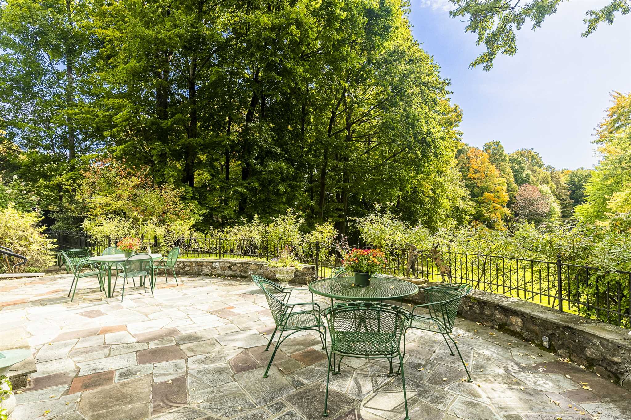 78 Maple Avenue Millbrook, NY 12545 - Photo 27 of 35 a backyard of a house with table and chairs