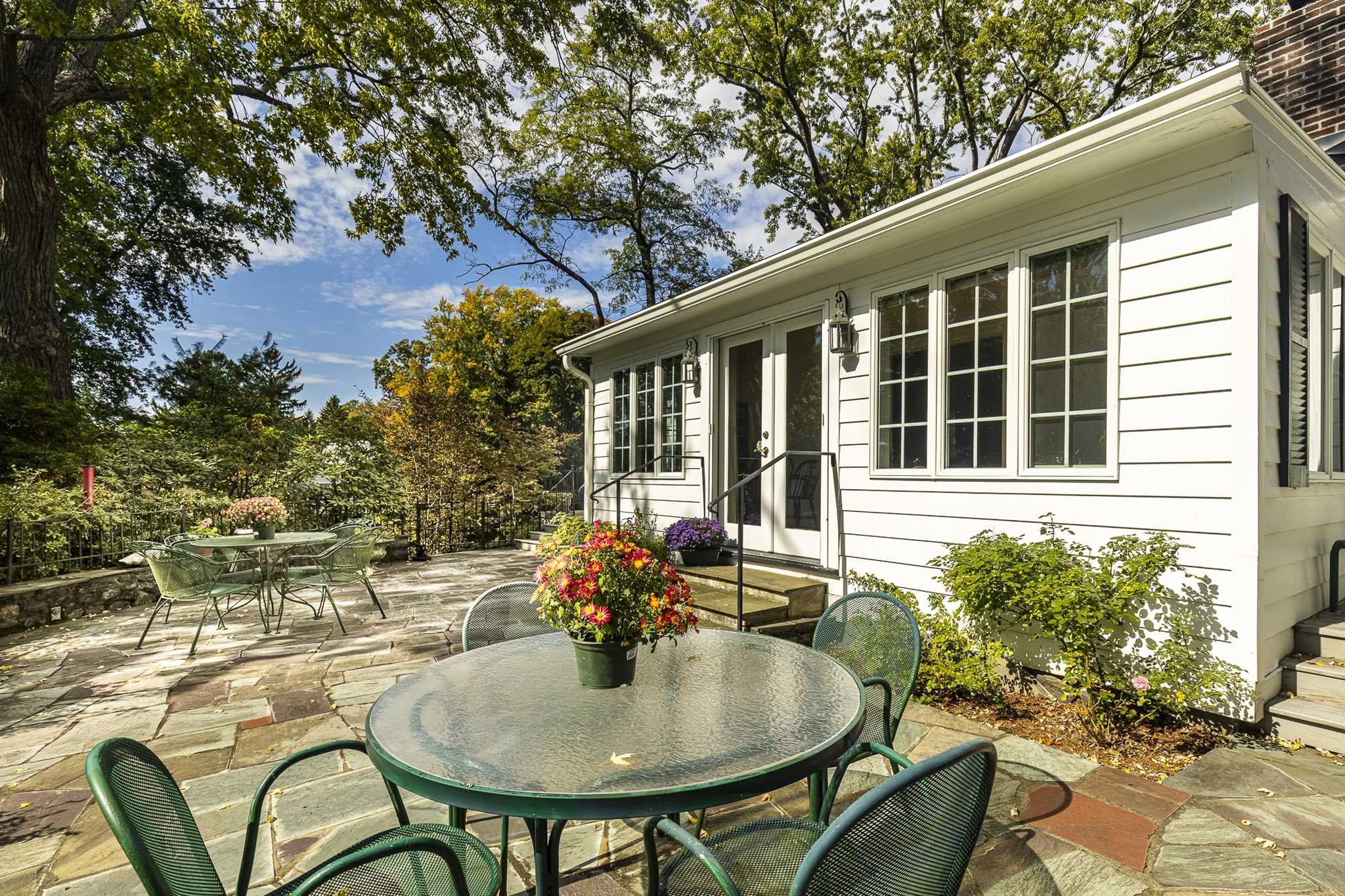 78 Maple Avenue Millbrook, NY 12545 - Photo 8 of 35 a backyard of a house with table and chairs