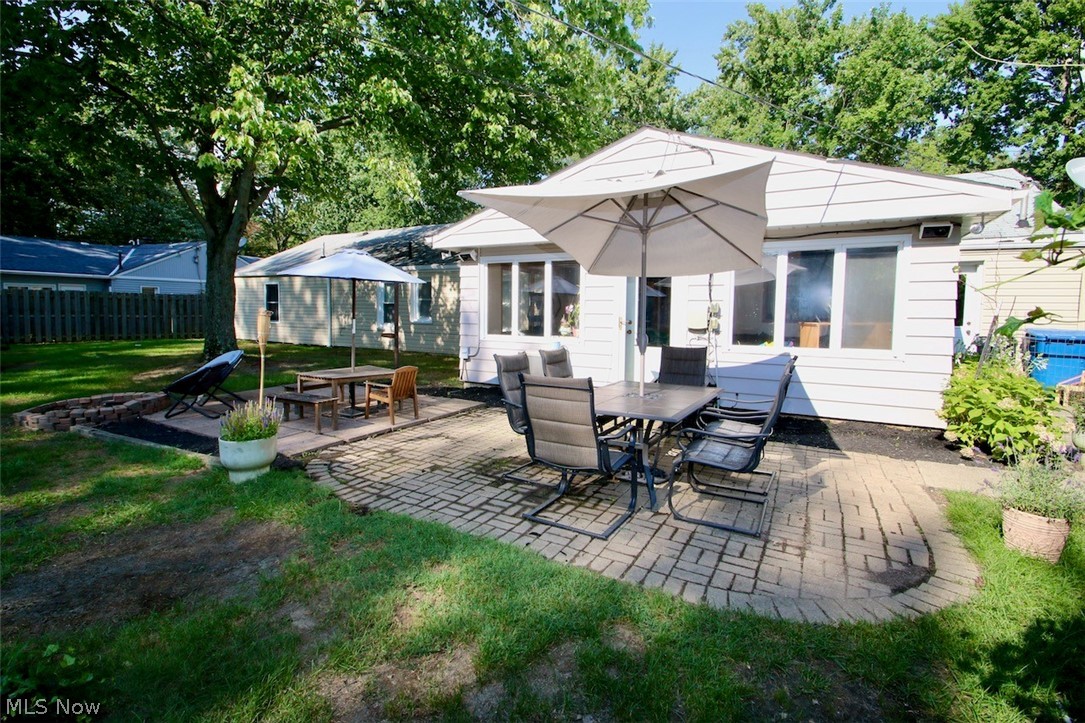 3 Nepahwin Road Timberlake, OH 44095 - Photo 2 of 22 Great yard with brick patio for your outdoor enjoyment