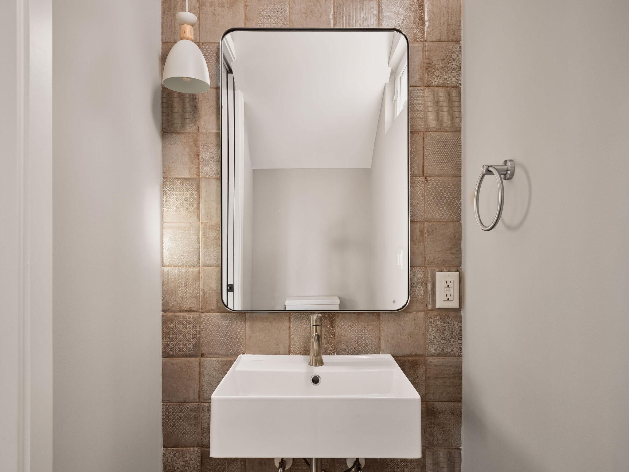 3209 Dolphin Drive, Unit 2 Austin, TX 78704 - Photo 13 of 28 Half bath with tile walls