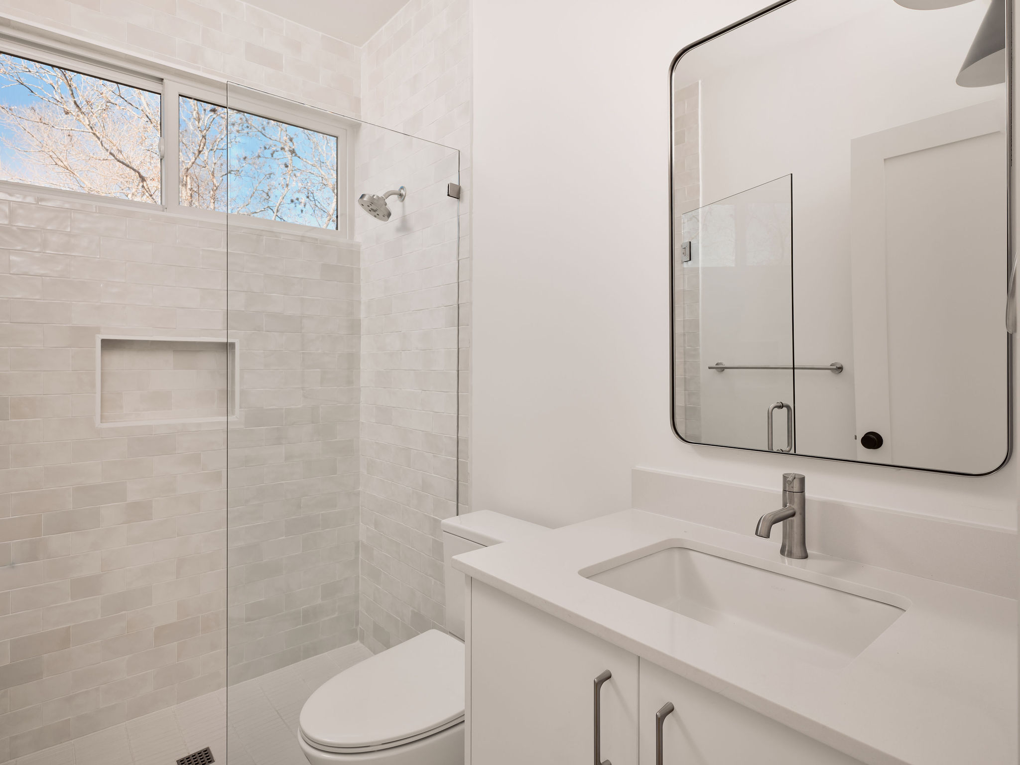 3209 Dolphin Drive, Unit 2 Austin, TX 78704 - Photo 15 of 28 Full bath featuring vanity and a shower stall