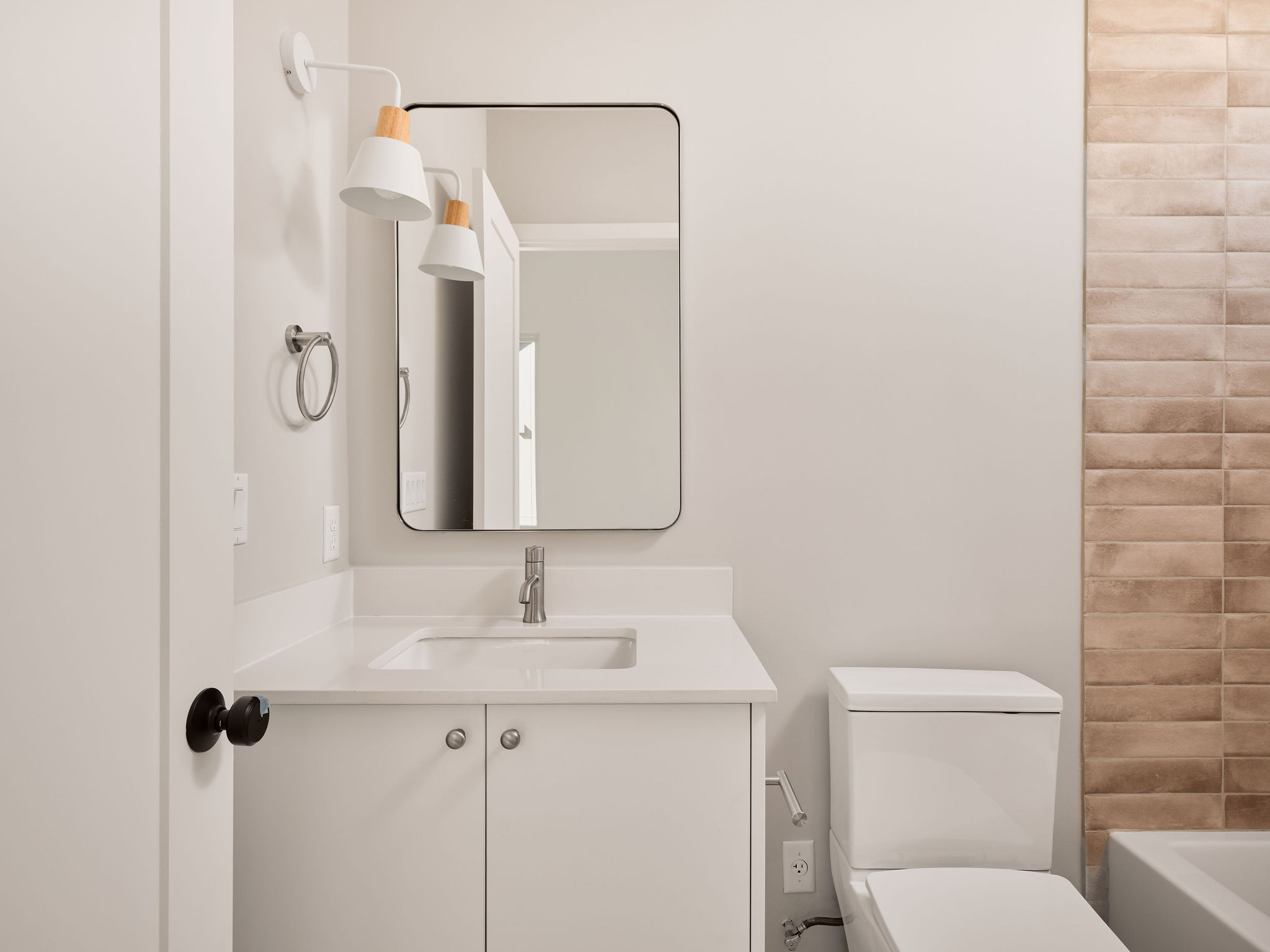 3209 Dolphin Drive, Unit 2 Austin, TX 78704 - Photo 18 of 28 Full bathroom featuring vanity and shower combination