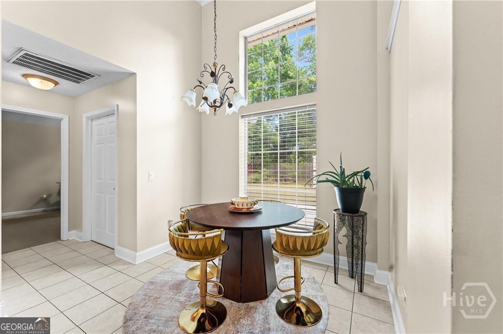 10 Fox Hound Court Pooler, GA 31322 - Photo 11 of 32 a dining room with furniture and window