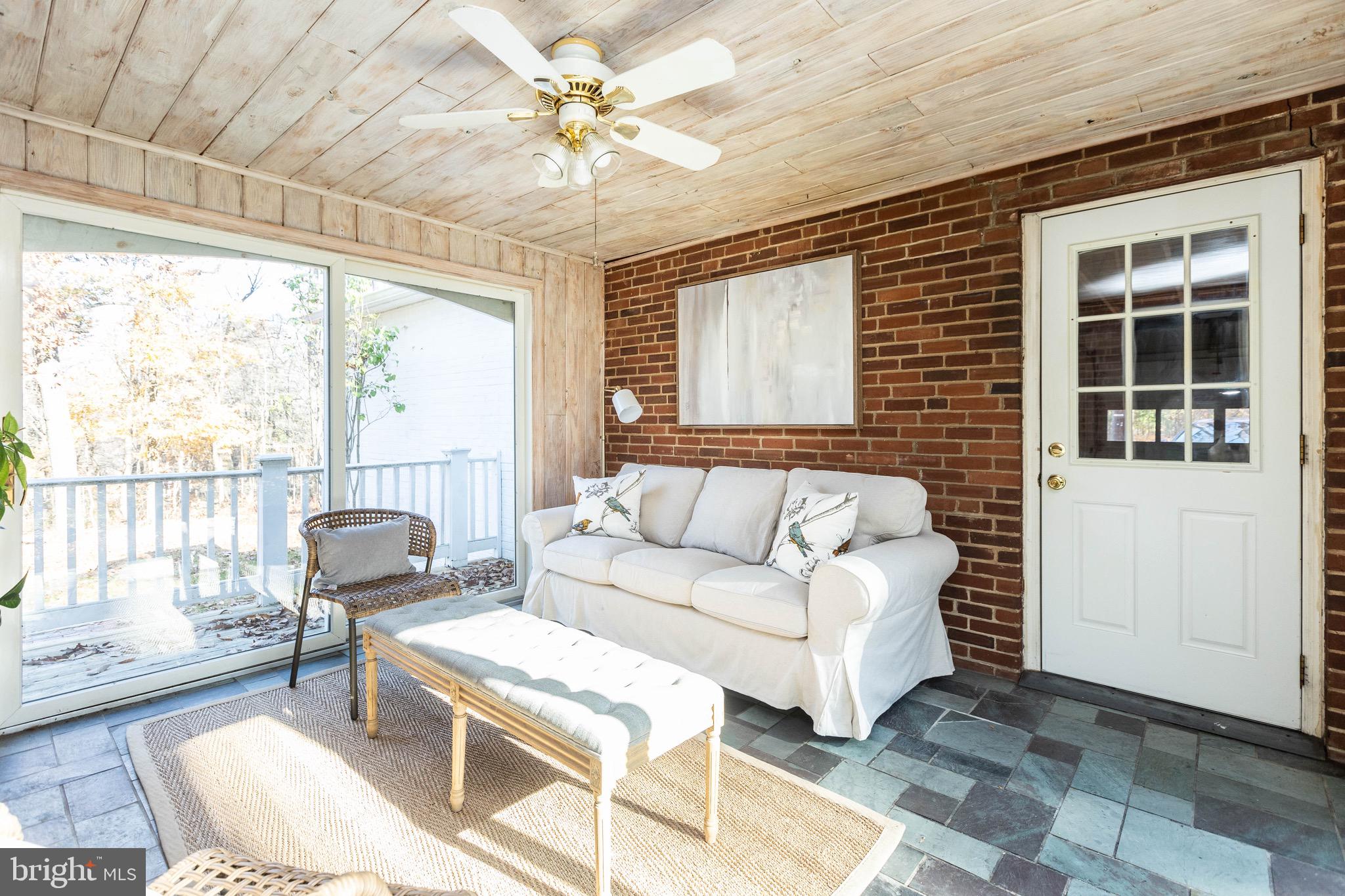 3204 Caves Road Owings Mills, MD 21117 - Photo 13 of 44 Very Sunny, ceiling fan & door into garage & Kitch