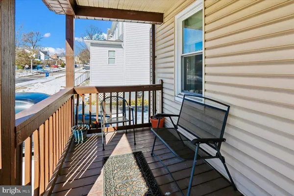 a view of a chairs on the balcony
