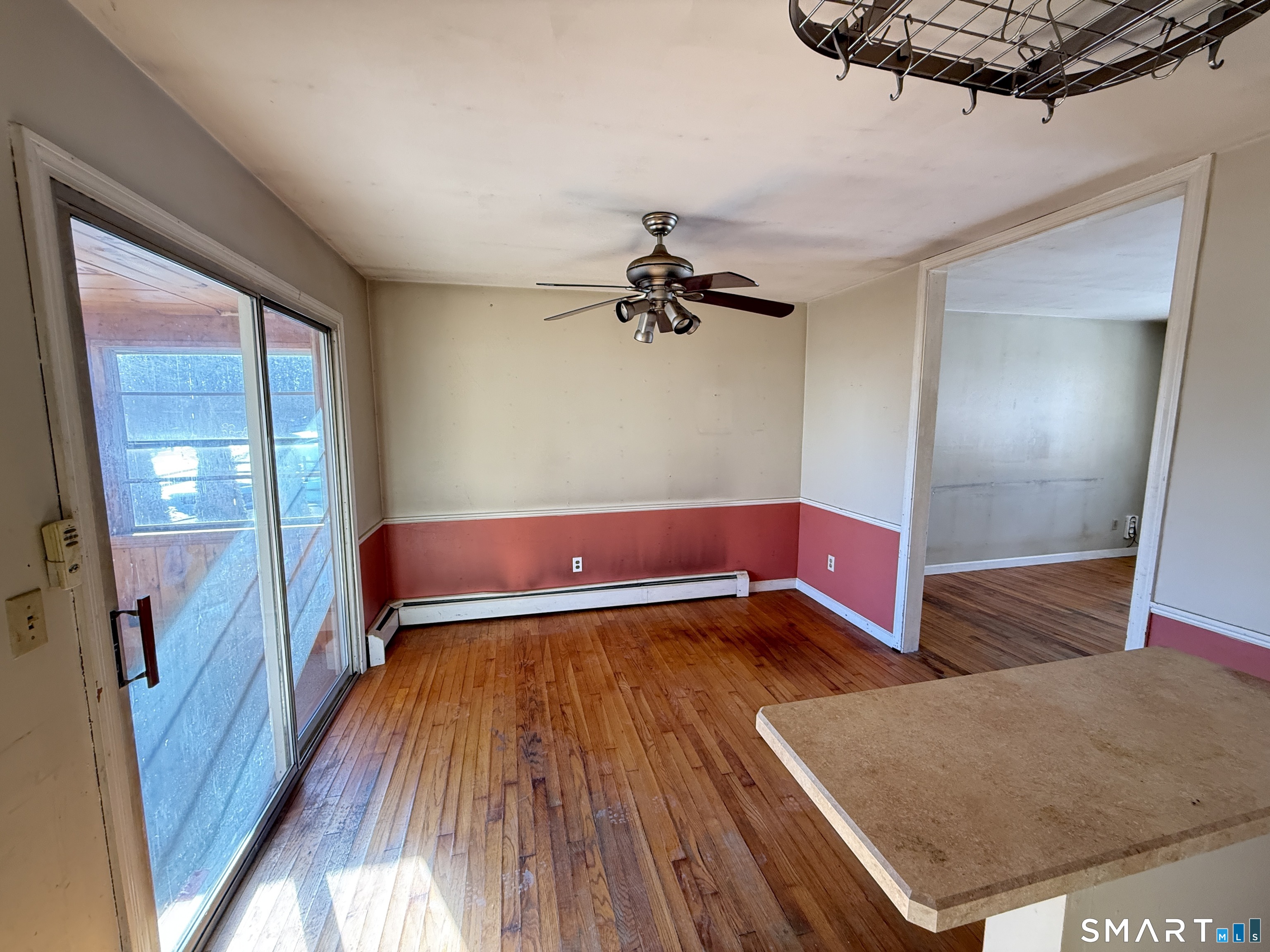 409 Boston Street Guilford, CT 06437 - Photo 13 of 28 a view of an empty room with a window