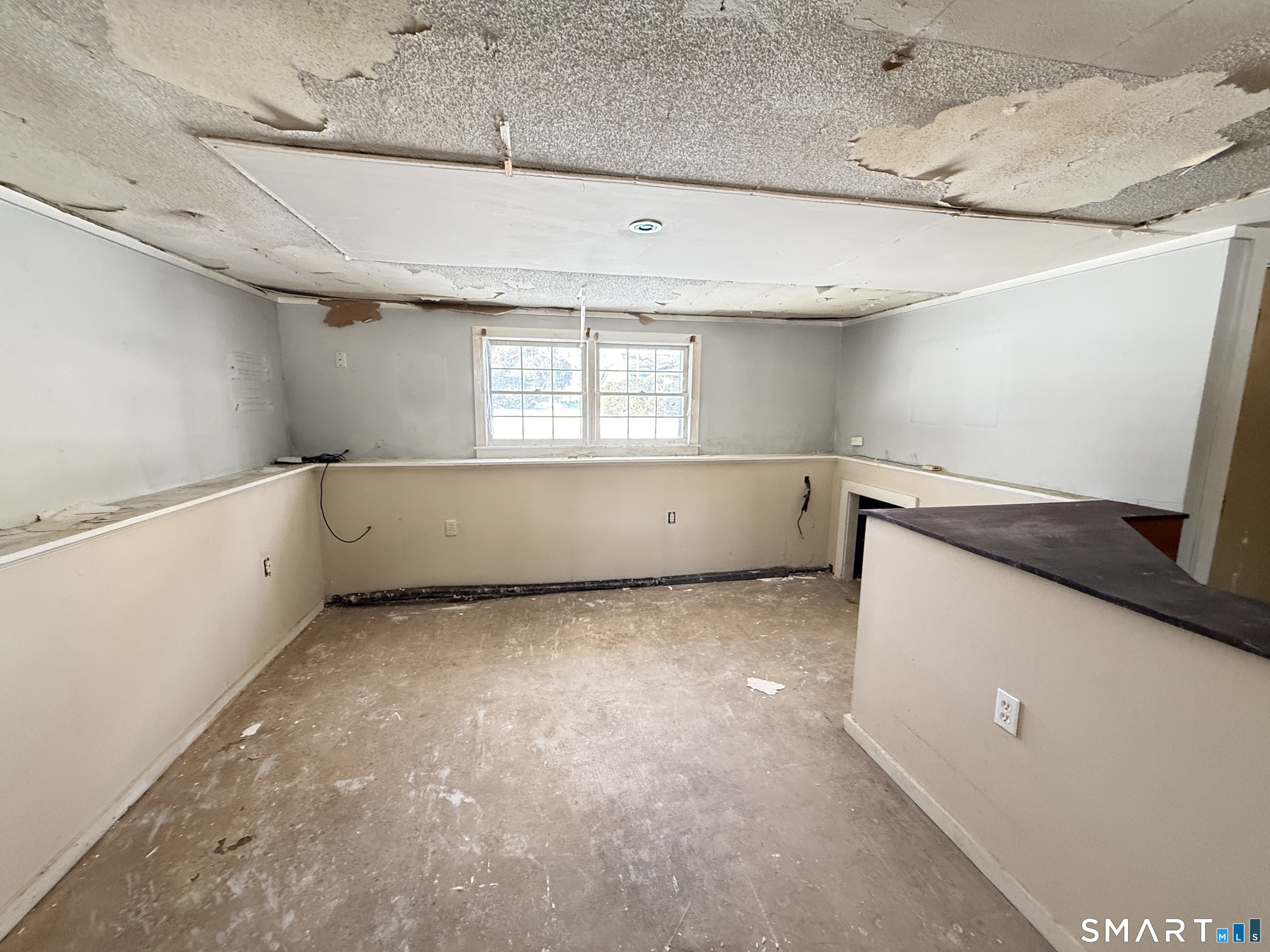 409 Boston Street Guilford, CT 06437 - Photo 25 of 28 a view of an empty room with a window