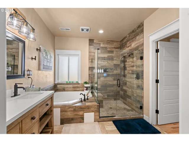 a utility room with sink dryer and washer